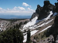 Late July snow fields on the north side of Castle Peak