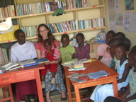 Reading with kids at the Kanyambeho Community Library